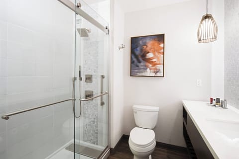 Deep soaking tub, designer toiletries, hair dryer, towels