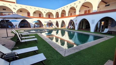 Outdoor pool, sun loungers