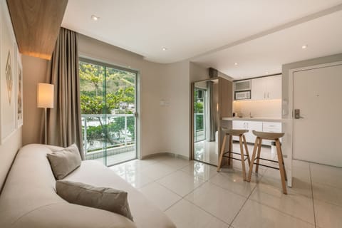 Premium Suite, 1 Bedroom, Lanai | Living area | 40-inch LCD TV with cable channels, TV