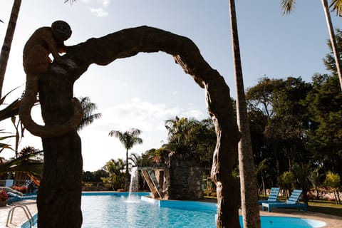 2 outdoor pools, open noon to 8:00 PM, pool umbrellas, sun loungers