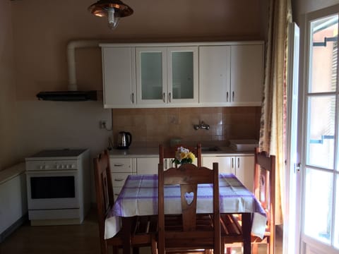 Apartment, 3 Bedrooms, Partial Sea View | Private kitchen | Fridge, electric kettle, cookware/dishes/utensils