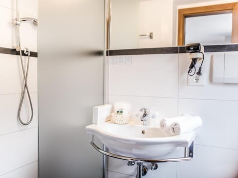 Shower, free toiletries, hair dryer, bathrobes