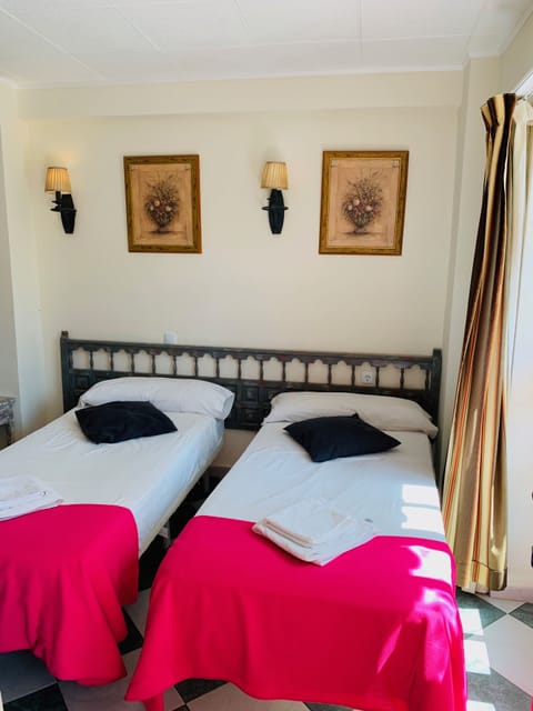 Quadruple Room, Private Bathroom | Iron/ironing board, free WiFi, bed sheets