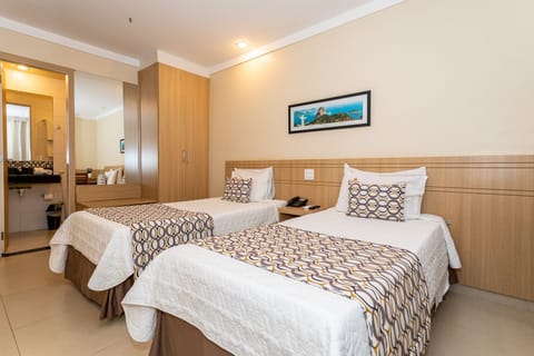 Standard Twin Room, 2 Twin Beds, Private Bathroom | Minibar, in-room safe, desk, blackout drapes