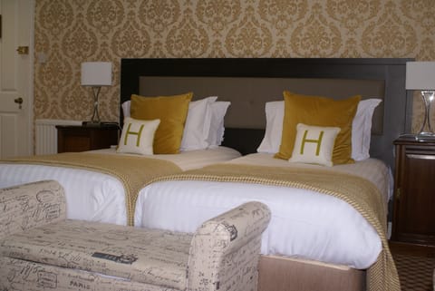 Desk, laptop workspace, blackout drapes, iron/ironing board