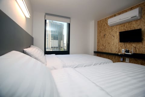 Deluxe Twin Room | Blackout drapes, free WiFi, bed sheets