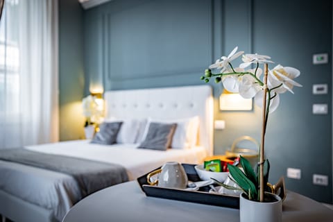 Quadruple Room | Hypo-allergenic bedding, down comforters, minibar, in-room safe