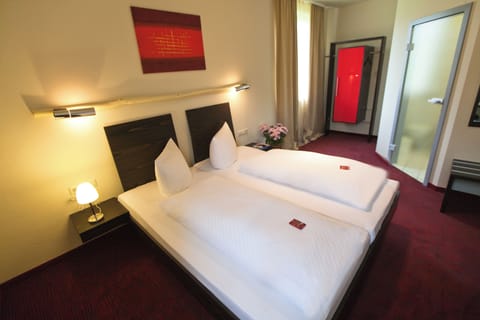 Hypo-allergenic bedding, desk, laptop workspace, iron/ironing board