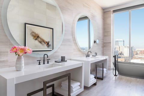 Premium bedding, down comforters, pillowtop beds, minibar