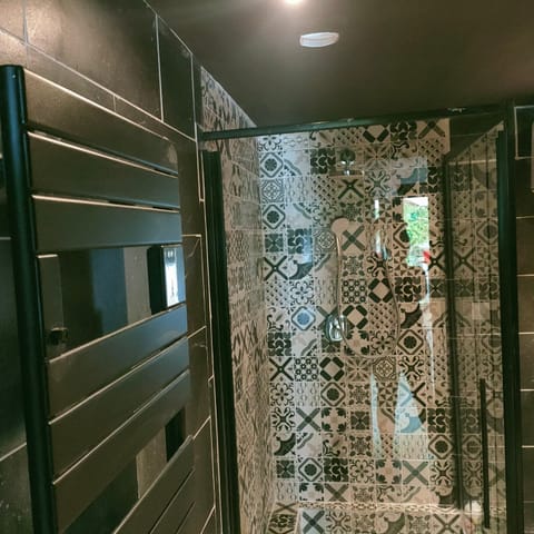 Romantic Room | Bathroom | Shower, rainfall showerhead, hair dryer, bathrobes