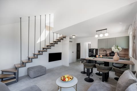 Family Apartment, 3 Bedrooms, Sea View | Living area | 40-inch LCD TV with cable channels, TV