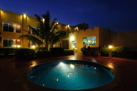 Seasonal outdoor pool, pool umbrellas