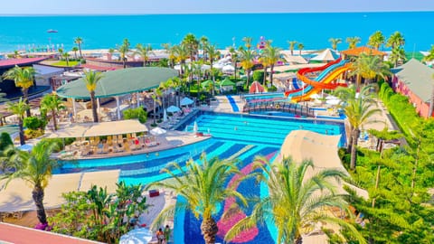 Indoor pool, 3 outdoor pools, open 6:00 AM to 8:00 PM, pool umbrellas