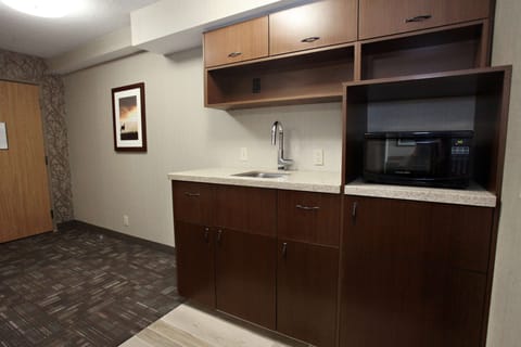 Suite, 1 King Bed, Non Smoking, Refrigerator | Iron/ironing board, free cribs/infant beds, free WiFi, bed sheets