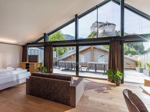 Deluxe Studio Suite, 1 Bedroom, Non Smoking, Sauna | Living area | 43-inch Smart TV with cable channels, TV