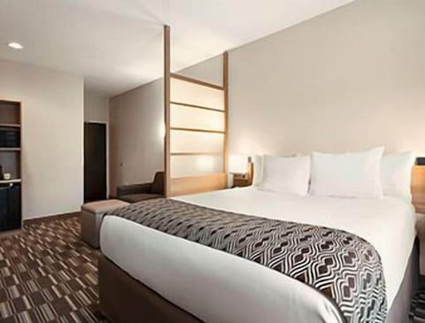 Desk, laptop workspace, blackout drapes, iron/ironing board