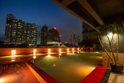 Outdoor pool, open 7:00 AM to 8:00 PM, sun loungers