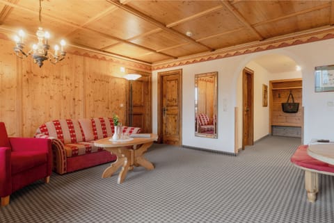 Superior Suite | Living area | Flat-screen TV, table tennis