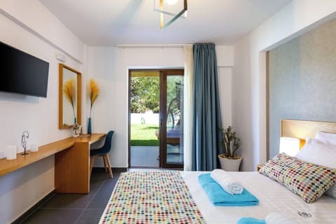 Apartment, 1 Bedroom, Pool View | Pillowtop beds, in-room safe, desk, laptop workspace