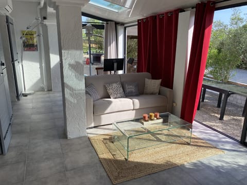 Family Suite | Living area | 55-inch flat-screen TV with cable channels, TV, DVD player