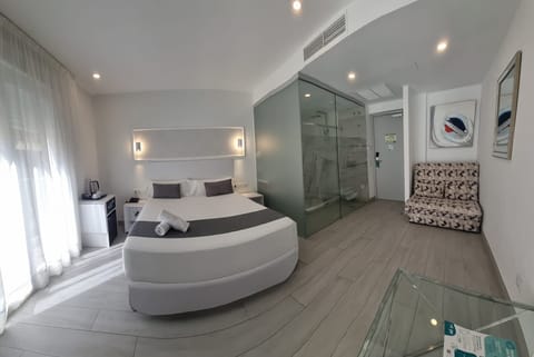 Standard Double or Twin Room, Balcony | Minibar, in-room safe, desk, blackout drapes