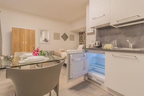 Apartment | Private kitchen | Fridge, stovetop, cookware/dishes/utensils