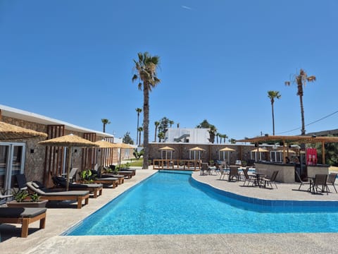 2 outdoor pools, open 10:00 AM to 6:00 PM, pool umbrellas, sun loungers