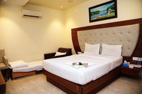 Deluxe Triple Ac Room | Free WiFi, bed sheets