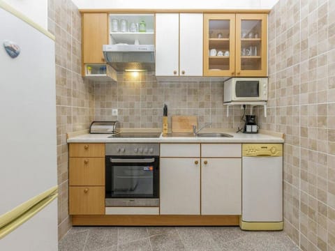 Apartment (Two Bedroom Apartment) | Private kitchen | Fridge