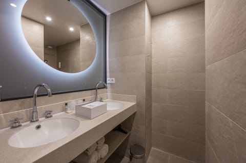 Shower, eco-friendly toiletries, hair dryer, towels