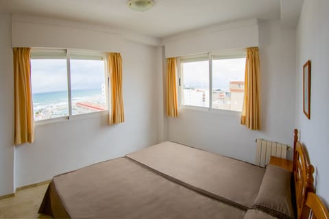 Apartment, 2 Bedrooms, Balcony | 2 bedrooms, pillowtop beds, in-room safe, iron/ironing board