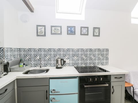 Fridge, electric kettle, toaster, cookware/dishes/utensils