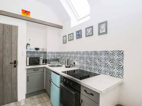 Fridge, electric kettle, toaster, cookware/dishes/utensils