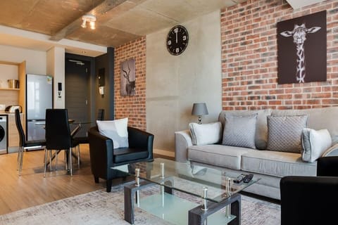 City Apartment | Living area | 40-inch flat-screen TV with cable channels, TV, streaming services