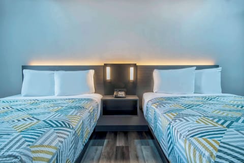 Deluxe Room, 2 Double Beds, Non Smoking | Free WiFi, bed sheets