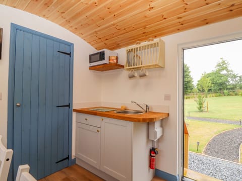 Fridge, electric kettle, toaster, cookware/dishes/utensils