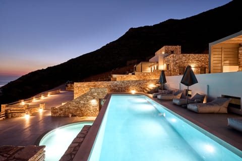 Outdoor pool, open 10:00 AM to 8:00 PM, free cabanas, pool umbrellas