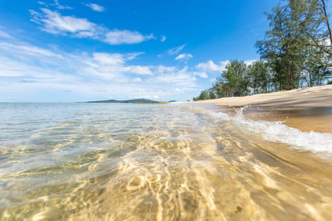 Private beach nearby, white sand