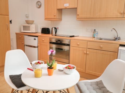 Fridge, electric kettle, toaster, cookware/dishes/utensils