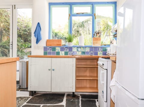 Fridge, dishwasher, electric kettle, cookware/dishes/utensils