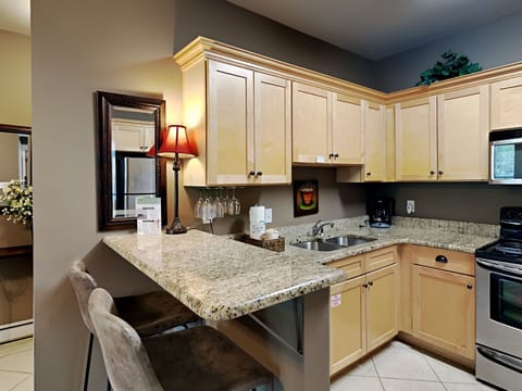 Condo, Multiple Beds, Balcony (#713 - No Pets) | Private kitchen | Fridge, microwave, oven, stovetop