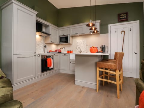 Fridge, electric kettle, toaster, cookware/dishes/utensils