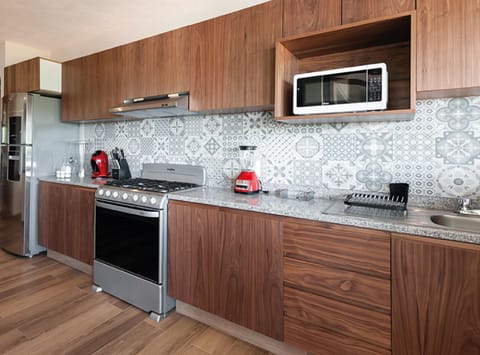 Microwave, oven, coffee/tea maker, cookware/dishes/utensils