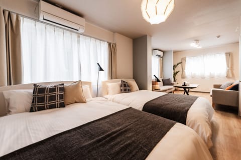 Twin Room with Kitchenette, Shower & Toilet (No Elevator) - Room 205, Non Smoking | Individually decorated, desk, free WiFi, bed sheets
