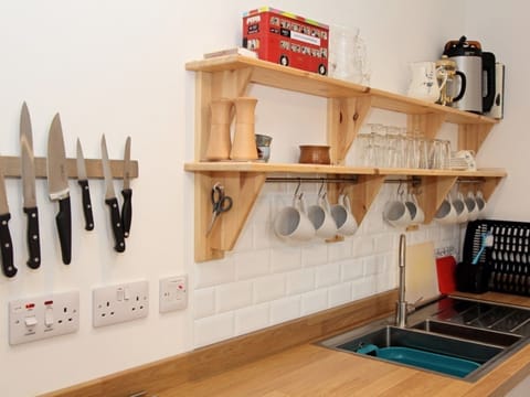 Fridge, dishwasher, cookware/dishes/utensils