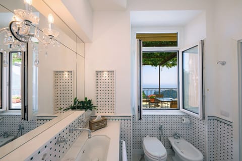 Suite, Sea View | Minibar, in-room safe, desk, blackout drapes