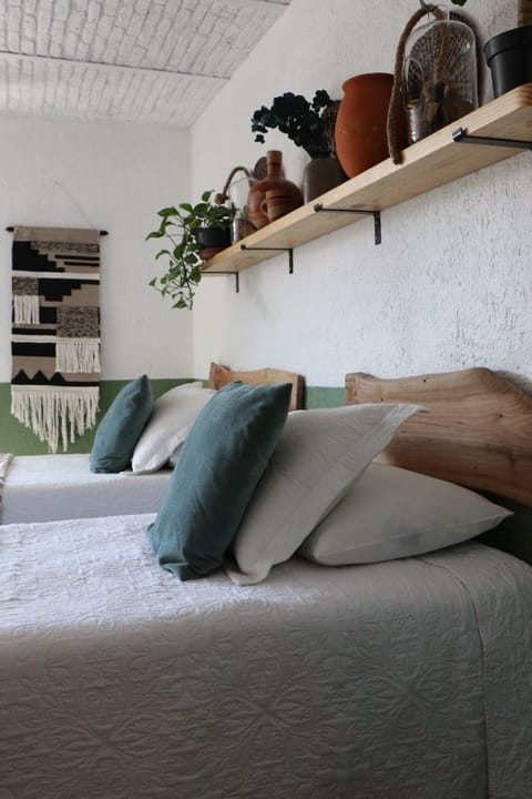 Premium bedding, down comforters, memory foam beds, laptop workspace