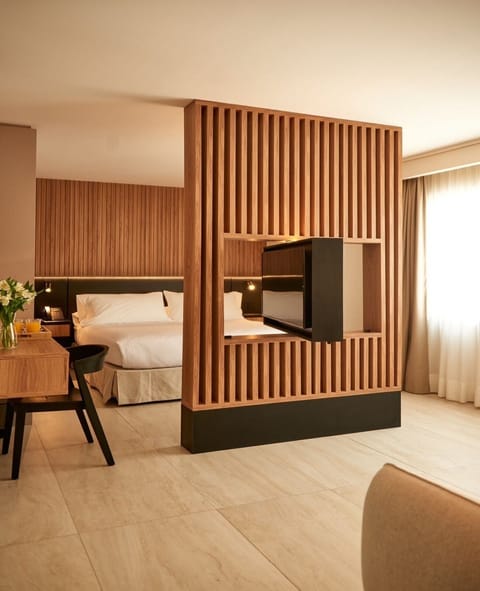 Standard Suite, 1 King Bed, Non Smoking | In-room safe, soundproofing, iron/ironing board, free WiFi