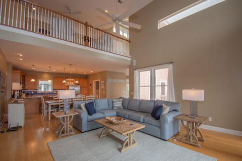 House, Multiple Beds, Balcony, Garden View | Living area | 40-inch TV with digital channels