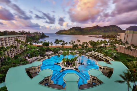 Outdoor pool, open 7:00 AM to 10:00 PM, cabanas (surcharge)